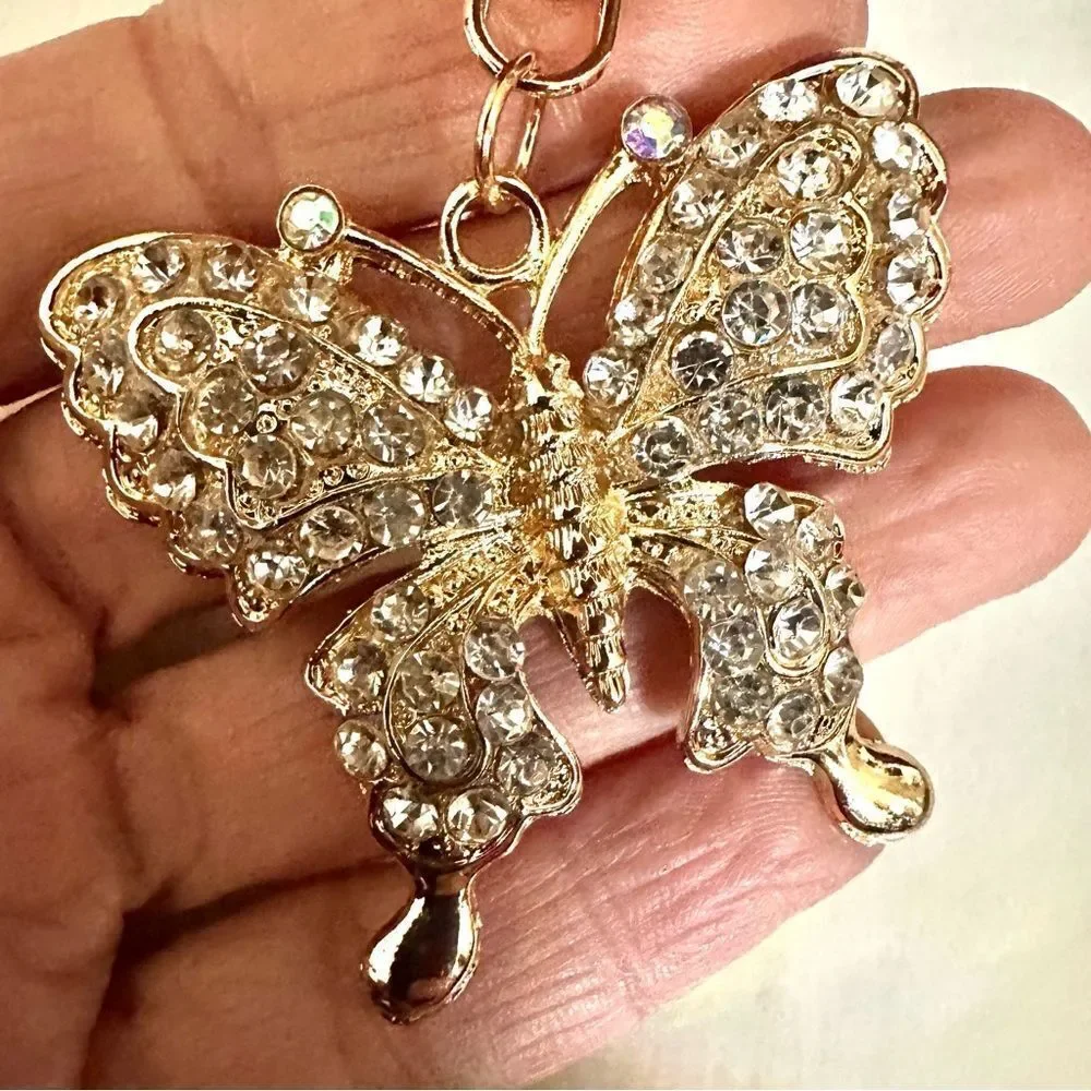 Gold tone butterfly rhinestone hang tag/keychain